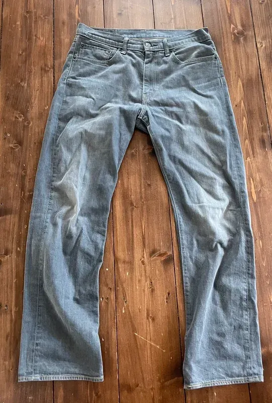 Jeans photographed at home before enhancement
